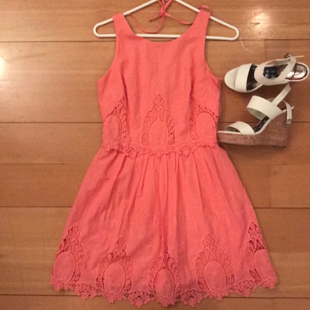 Pink sundress with lace embellishments